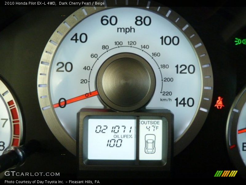 Dark Cherry Pearl / Beige 2010 Honda Pilot EX-L 4WD