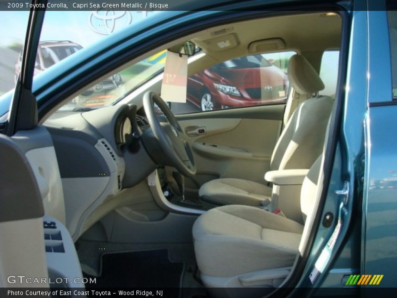 Capri Sea Green Metallic / Bisque 2009 Toyota Corolla