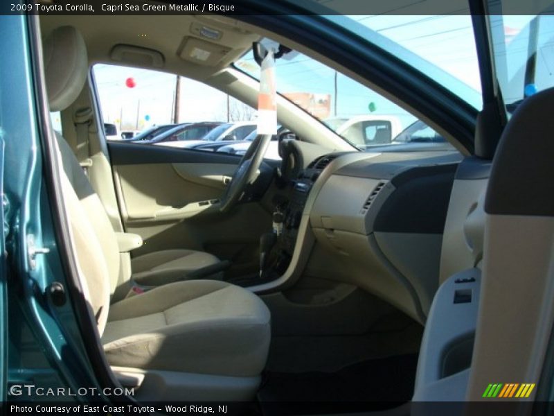 Capri Sea Green Metallic / Bisque 2009 Toyota Corolla