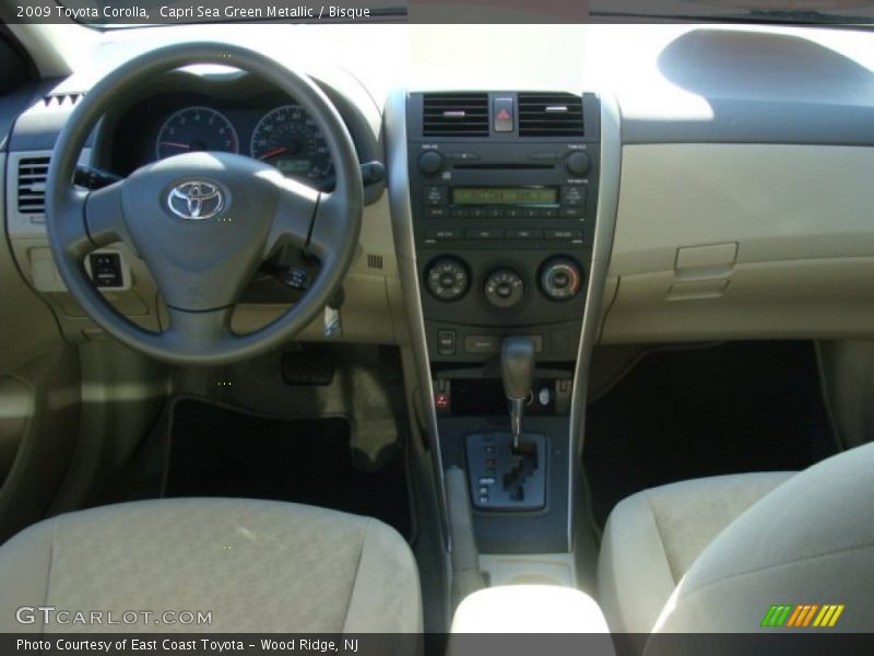 Capri Sea Green Metallic / Bisque 2009 Toyota Corolla