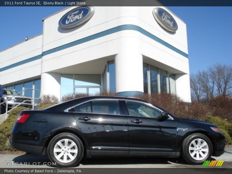 Ebony Black / Light Stone 2011 Ford Taurus SE