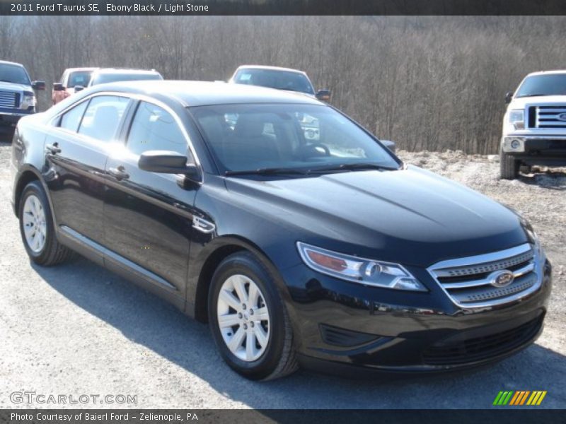 Ebony Black / Light Stone 2011 Ford Taurus SE