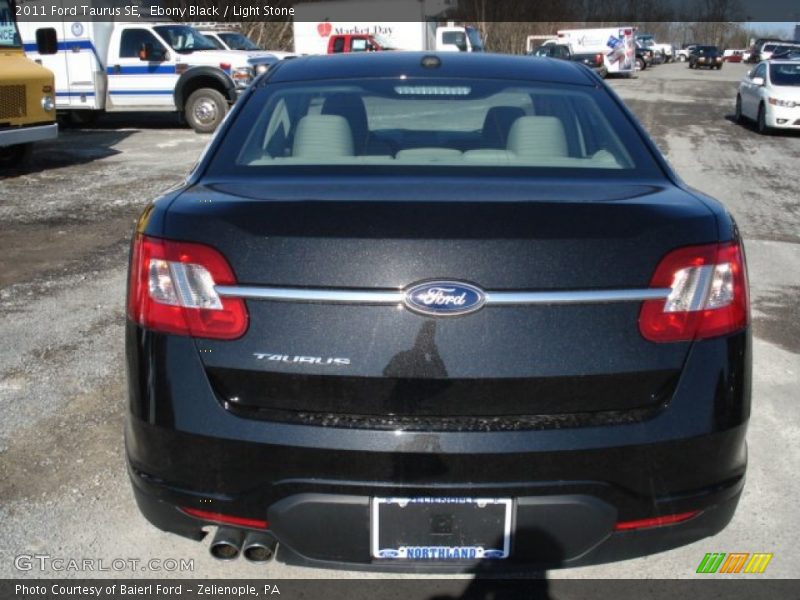 Ebony Black / Light Stone 2011 Ford Taurus SE