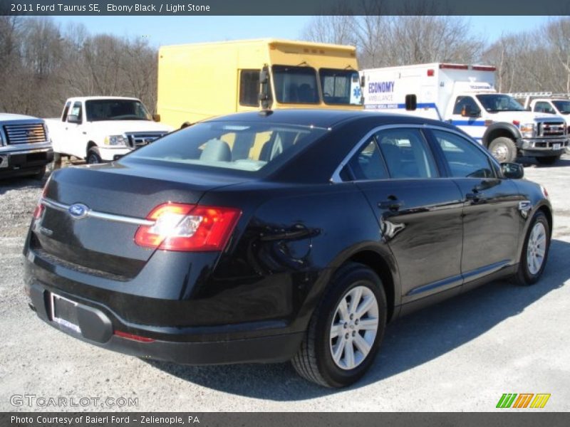 Ebony Black / Light Stone 2011 Ford Taurus SE