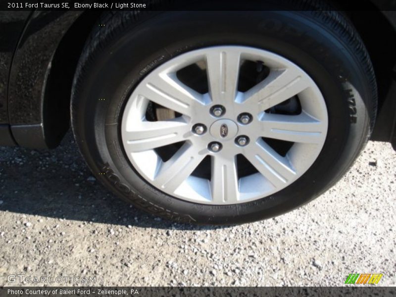 Ebony Black / Light Stone 2011 Ford Taurus SE