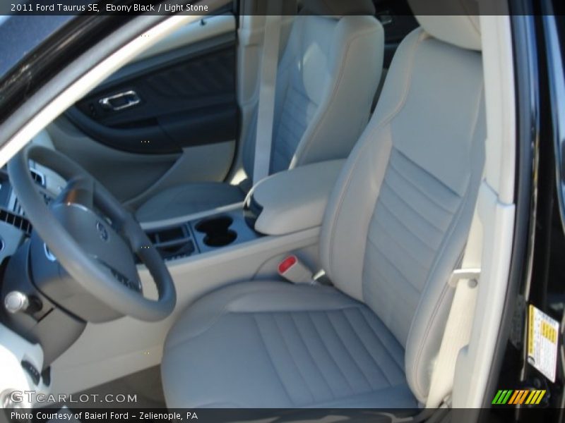 Ebony Black / Light Stone 2011 Ford Taurus SE