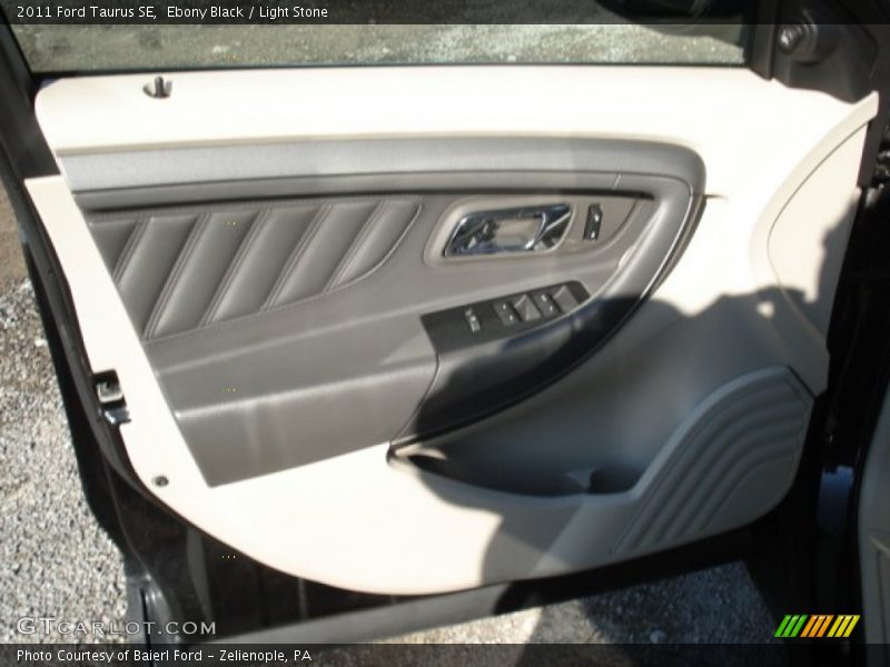 Ebony Black / Light Stone 2011 Ford Taurus SE