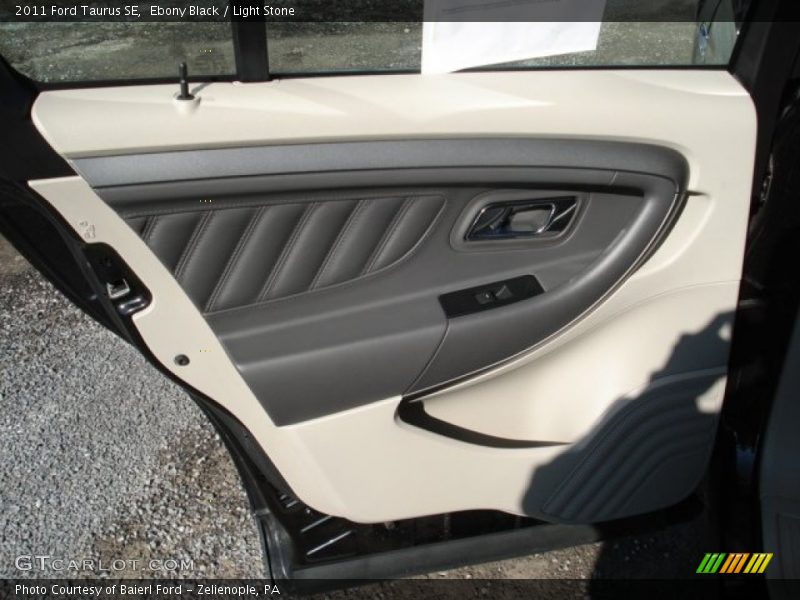 Ebony Black / Light Stone 2011 Ford Taurus SE