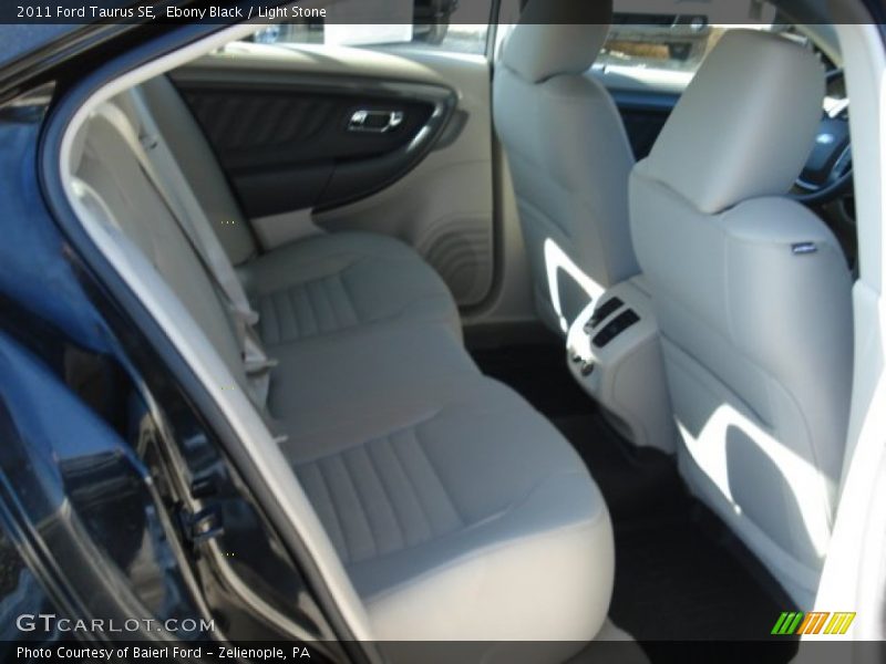 Ebony Black / Light Stone 2011 Ford Taurus SE