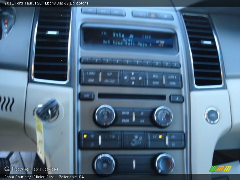Ebony Black / Light Stone 2011 Ford Taurus SE