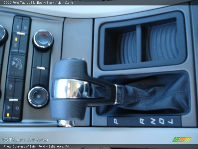 Ebony Black / Light Stone 2011 Ford Taurus SE