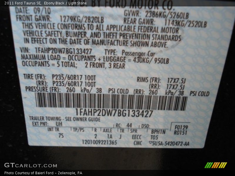 Ebony Black / Light Stone 2011 Ford Taurus SE