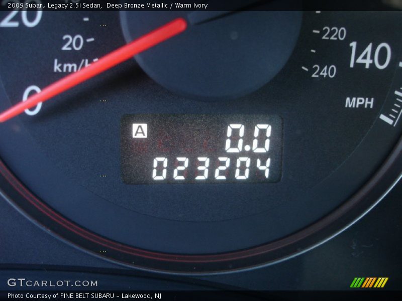 Deep Bronze Metallic / Warm Ivory 2009 Subaru Legacy 2.5i Sedan
