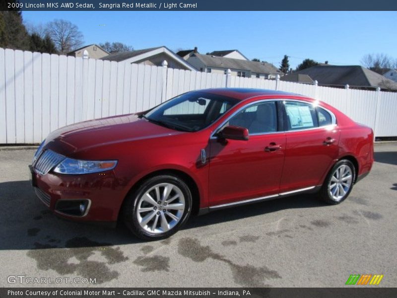 Sangria Red Metallic / Light Camel 2009 Lincoln MKS AWD Sedan
