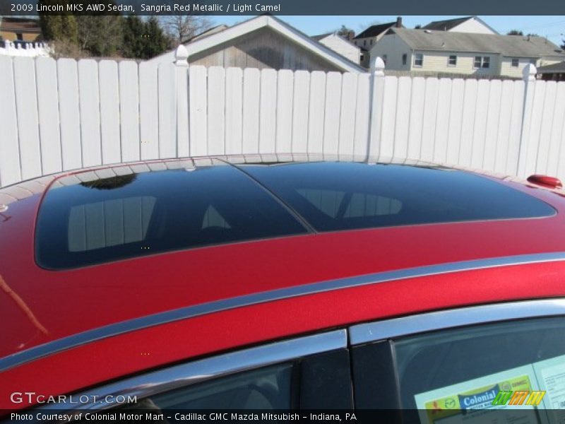 Sangria Red Metallic / Light Camel 2009 Lincoln MKS AWD Sedan