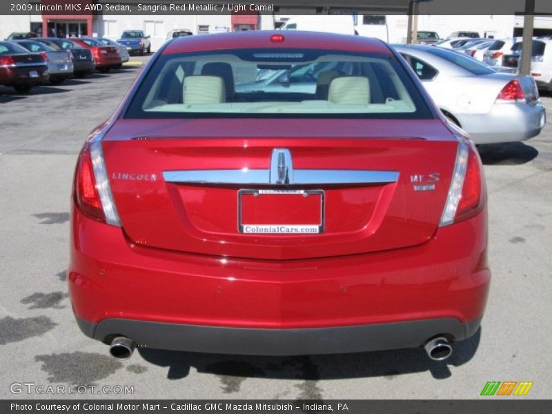 Sangria Red Metallic / Light Camel 2009 Lincoln MKS AWD Sedan