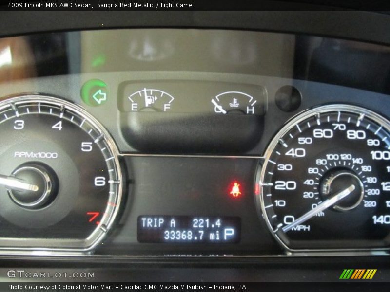 Sangria Red Metallic / Light Camel 2009 Lincoln MKS AWD Sedan