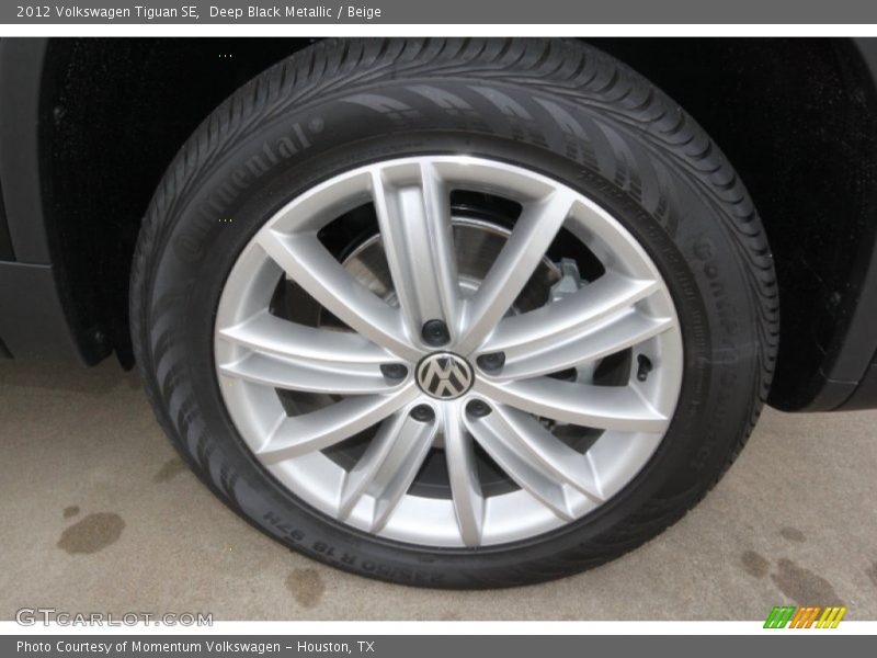 Deep Black Metallic / Beige 2012 Volkswagen Tiguan SE
