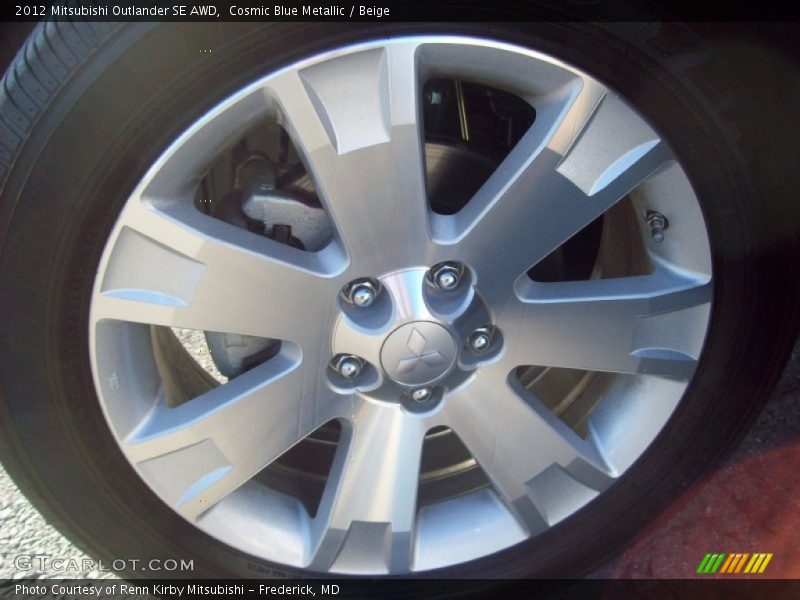 Cosmic Blue Metallic / Beige 2012 Mitsubishi Outlander SE AWD