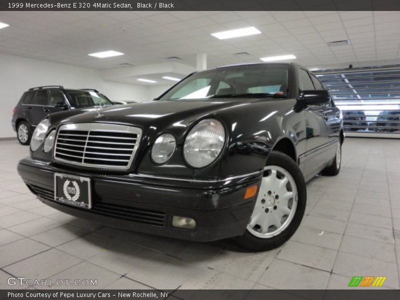 Black / Black 1999 Mercedes-Benz E 320 4Matic Sedan