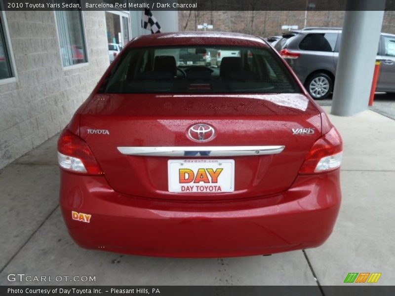 Barcelona Red Metallic / Dark Charcoal 2010 Toyota Yaris Sedan
