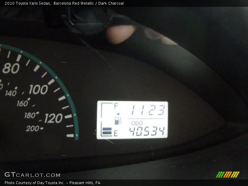 Barcelona Red Metallic / Dark Charcoal 2010 Toyota Yaris Sedan
