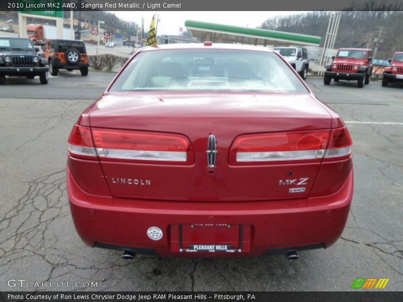 Sangria Red Metallic / Light Camel 2010 Lincoln MKZ AWD