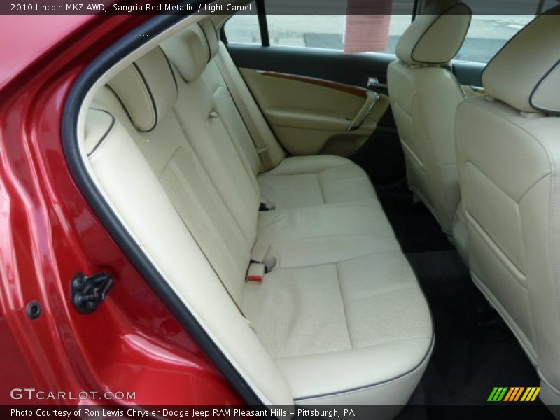 Sangria Red Metallic / Light Camel 2010 Lincoln MKZ AWD