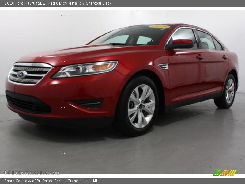 Red Candy Metallic / Charcoal Black 2010 Ford Taurus SEL