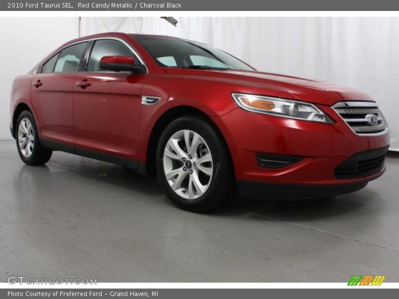Red Candy Metallic / Charcoal Black 2010 Ford Taurus SEL
