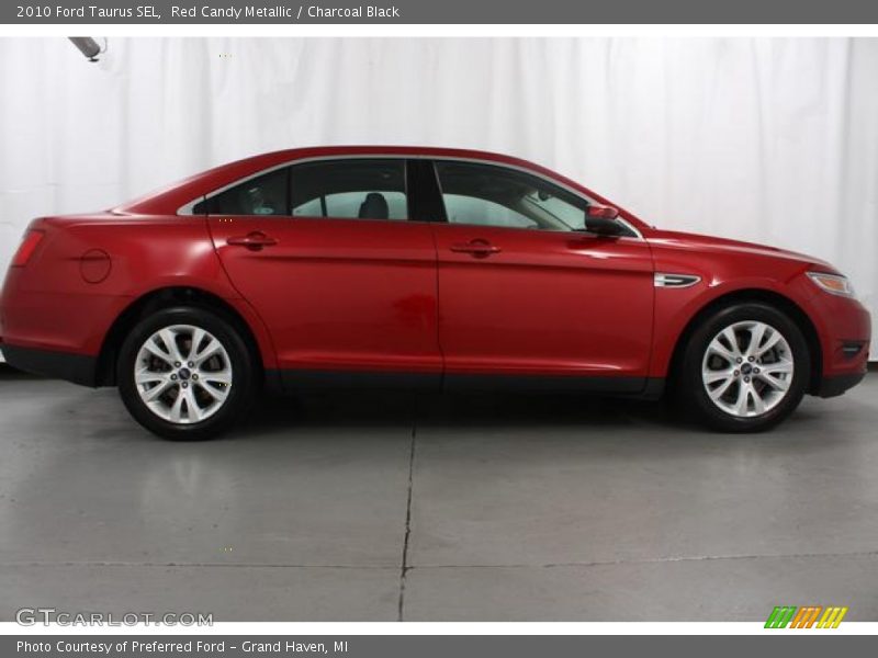 Red Candy Metallic / Charcoal Black 2010 Ford Taurus SEL