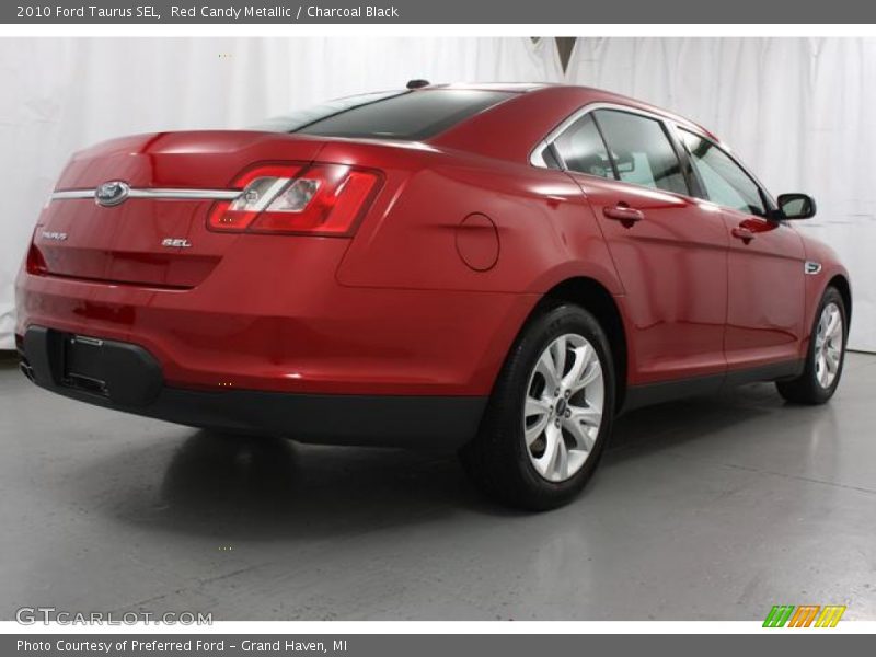 Red Candy Metallic / Charcoal Black 2010 Ford Taurus SEL