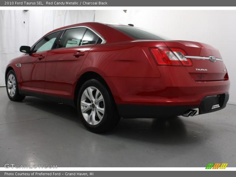 Red Candy Metallic / Charcoal Black 2010 Ford Taurus SEL