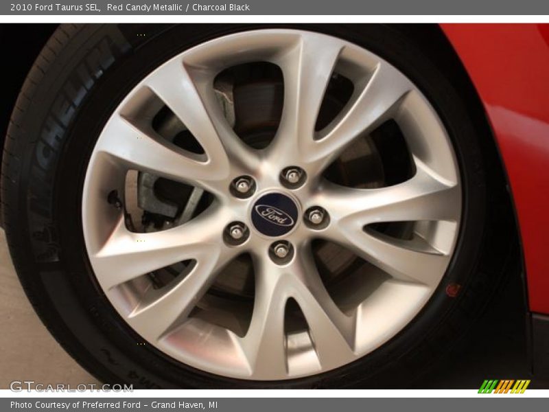 Red Candy Metallic / Charcoal Black 2010 Ford Taurus SEL