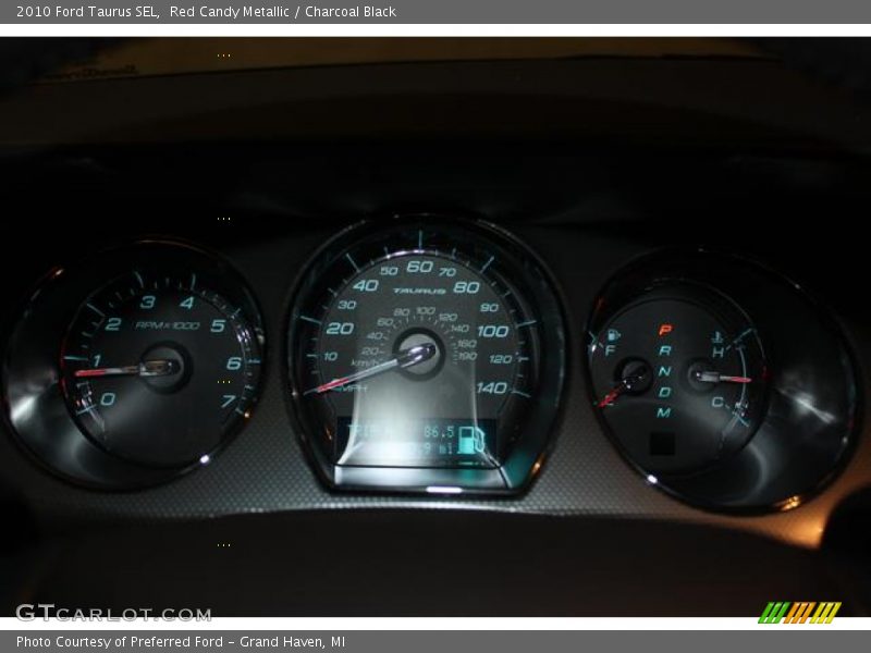 Red Candy Metallic / Charcoal Black 2010 Ford Taurus SEL