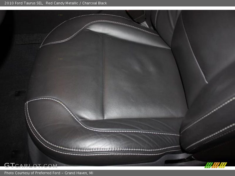 Red Candy Metallic / Charcoal Black 2010 Ford Taurus SEL