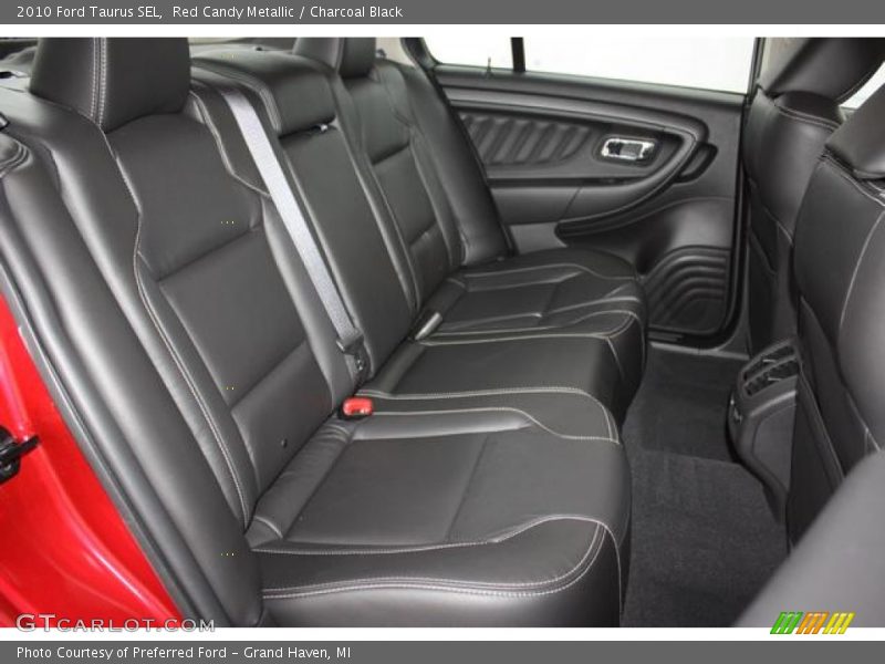 Red Candy Metallic / Charcoal Black 2010 Ford Taurus SEL