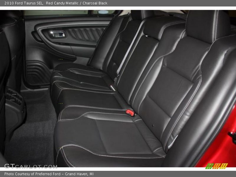 Red Candy Metallic / Charcoal Black 2010 Ford Taurus SEL
