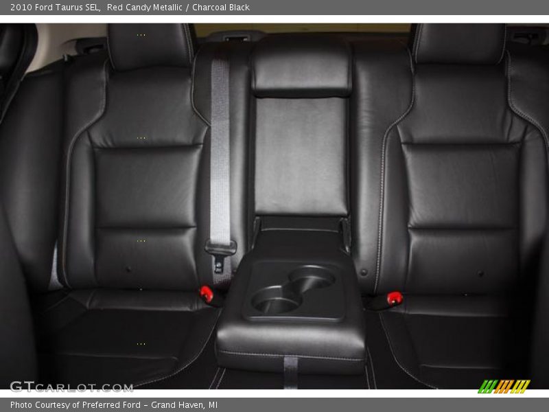 Red Candy Metallic / Charcoal Black 2010 Ford Taurus SEL
