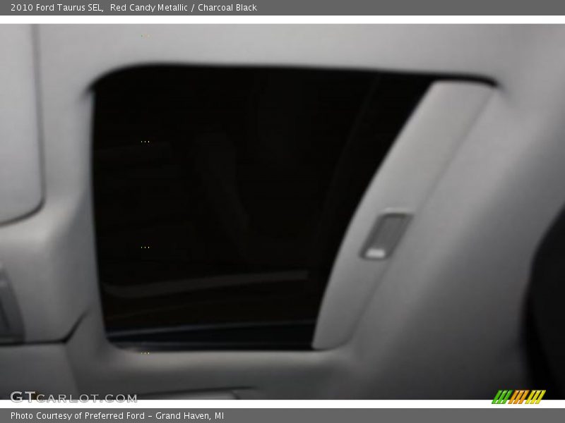 Red Candy Metallic / Charcoal Black 2010 Ford Taurus SEL