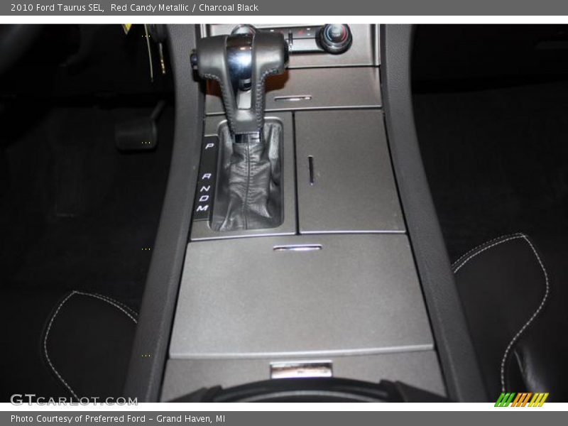 Red Candy Metallic / Charcoal Black 2010 Ford Taurus SEL