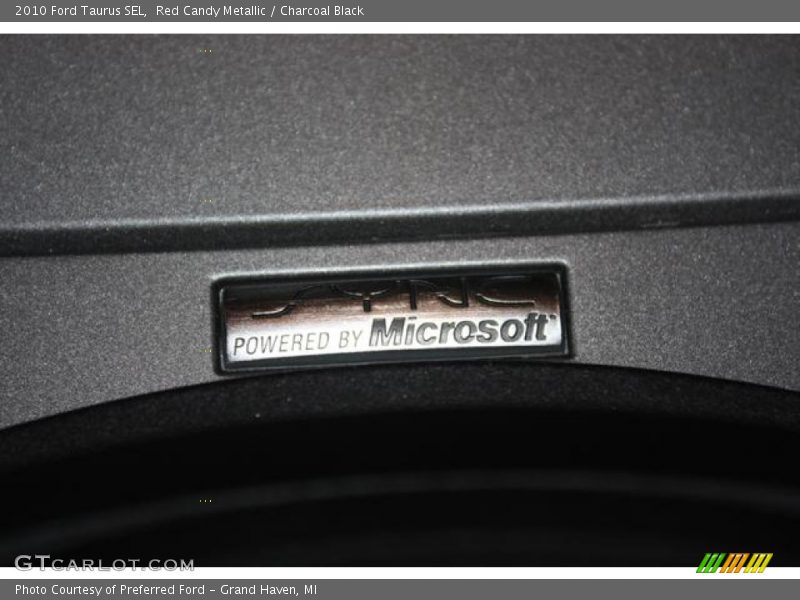Red Candy Metallic / Charcoal Black 2010 Ford Taurus SEL