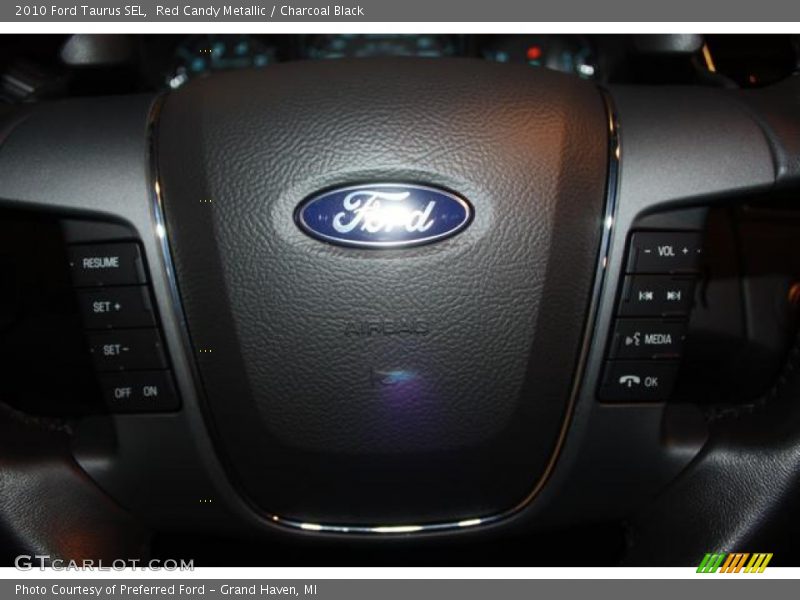 Red Candy Metallic / Charcoal Black 2010 Ford Taurus SEL