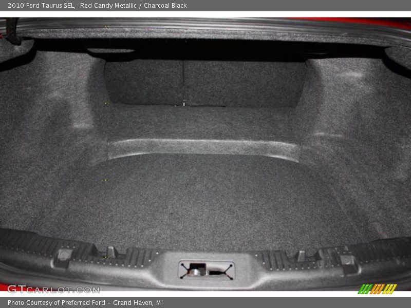 Red Candy Metallic / Charcoal Black 2010 Ford Taurus SEL