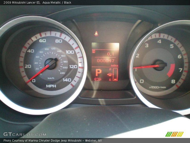 Aqua Metallic / Black 2009 Mitsubishi Lancer ES