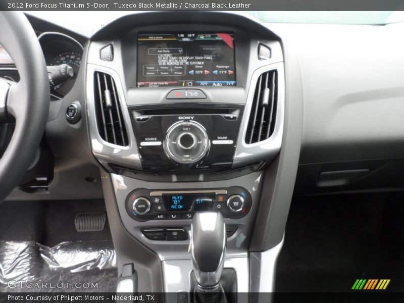 Tuxedo Black Metallic / Charcoal Black Leather 2012 Ford Focus Titanium 5-Door