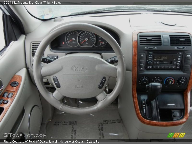 Clear White / Beige 2004 Kia Sedona EX