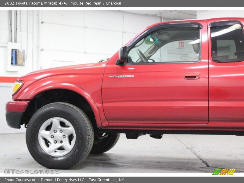 Impulse Red Pearl / Charcoal 2002 Toyota Tacoma Xtracab 4x4