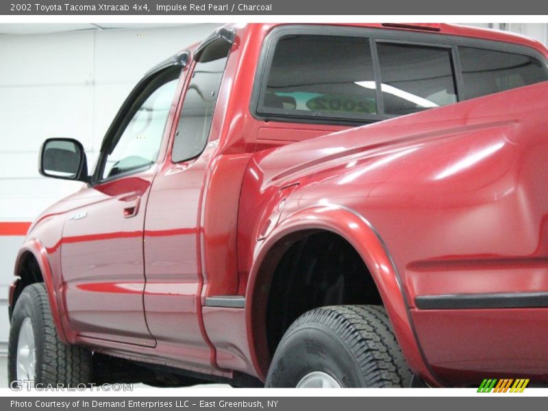 Impulse Red Pearl / Charcoal 2002 Toyota Tacoma Xtracab 4x4