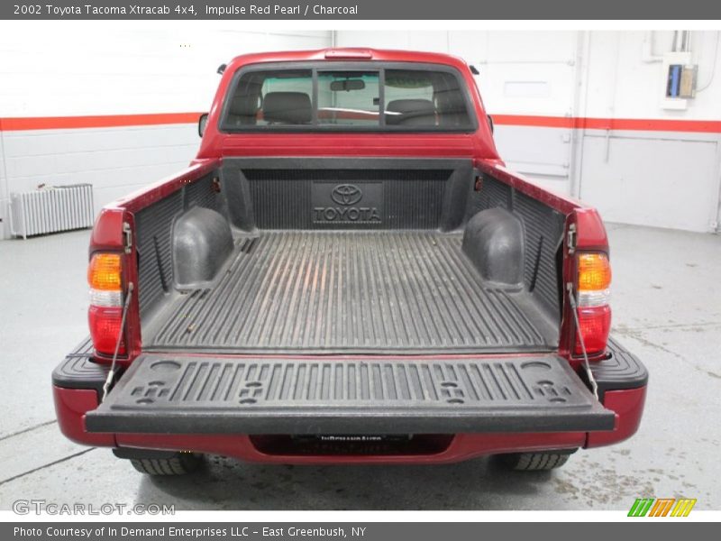 Impulse Red Pearl / Charcoal 2002 Toyota Tacoma Xtracab 4x4